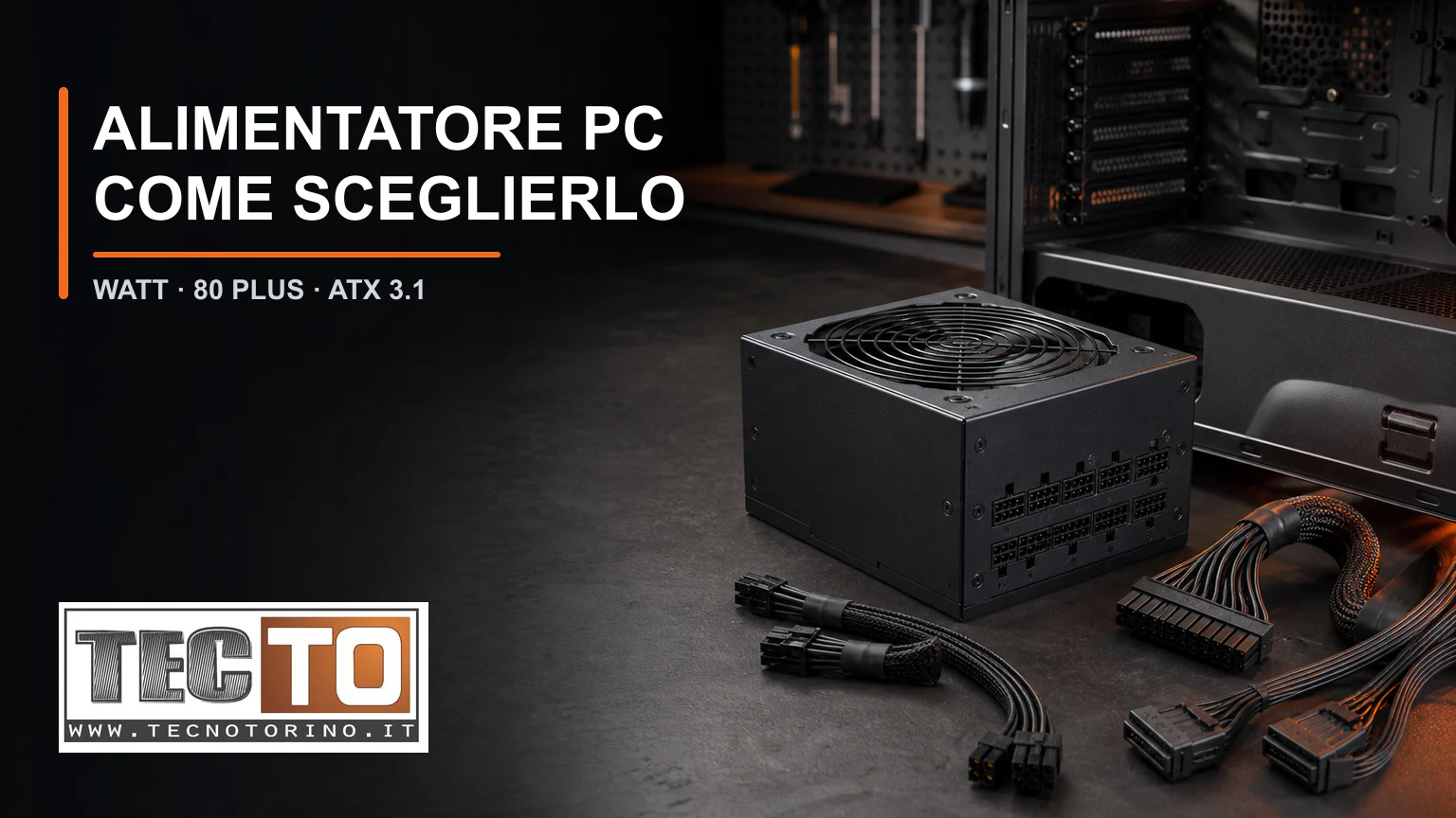 Alimentatore ATX modulare con cavi accanto a un computer desktop aperto